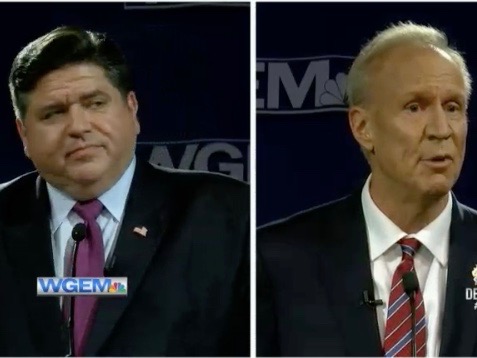 J.B. Pritzker looks askance at Gov. Bruce Rauner in their third and final televised debate in Quincy. (WGEM-TV)