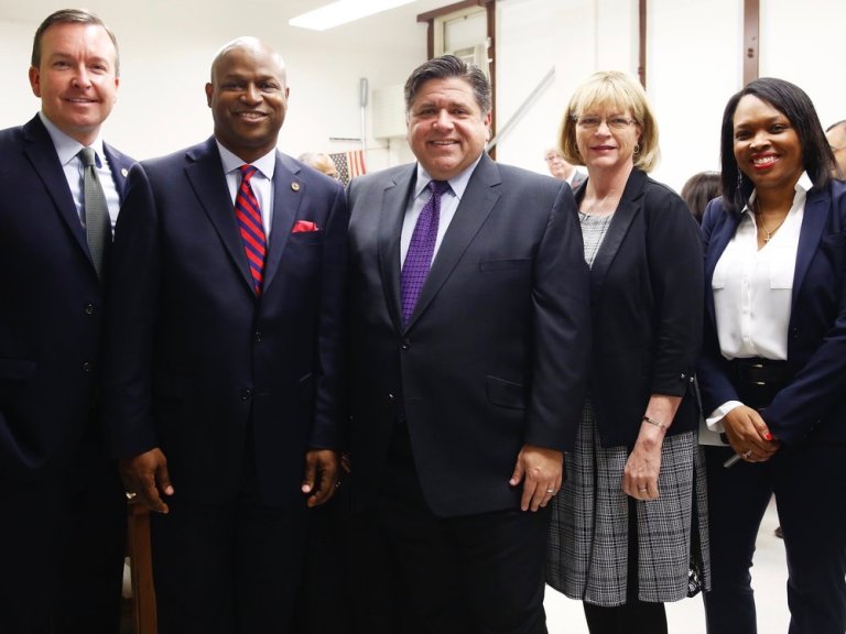 Gov.-elect Pritzker (center) with the leaders of his education transition committee: state Sen. Andy Manar, state Rep. Chris Welch, IEA President Kathi Griffin, and CPS CEO Janice Jackson. (Pritzker Transition Press Team) 