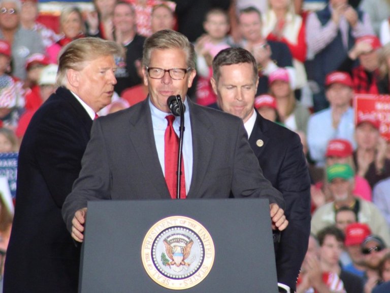 President Donald Trump with Congressmen Randy Hultgren and Rodney Davis at a campaign rally in Murphysboro the weekend before the midterms: Hultgren paid the price for unwavering support for the president, but Davis survived in a district Trump won more comfortably in 2016. (One Illinois/Ted Cox)