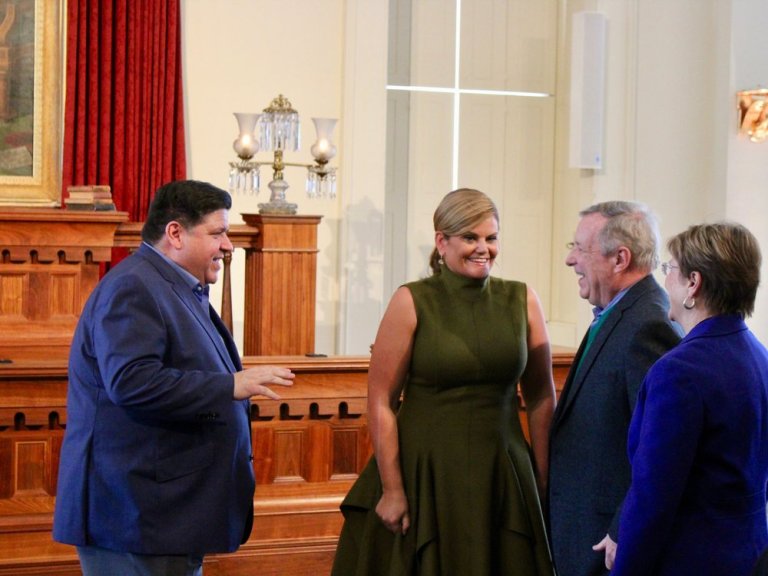 J.B. and M.K. Pritzker greet a couple of Springfield residents, U.S. Sen. Dick Durbin and his wife, Loretta, at an open house held Sunday in the Old State Capitol. (One Illinois/Ted Cox)