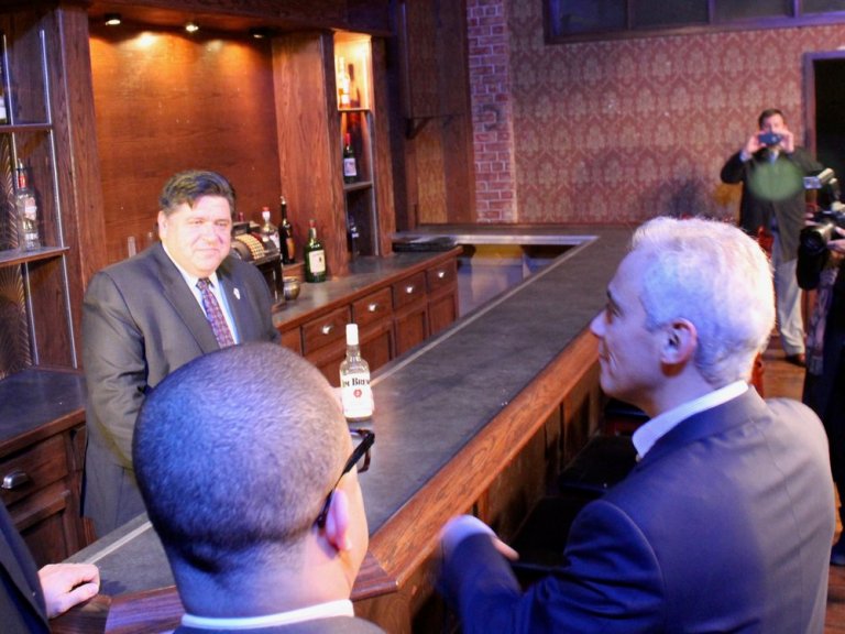 Gov. Pritzker and Chicago’s Mayor Emanuel visit a barroom set Thursday at Cinespace Studios. (One Illinois/Ted Cox)