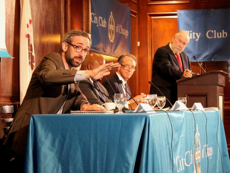 Rep. Will Guzzardi makes a point as Sen. Chuck Weaver (seated to the far right) looks on during Monday’s forum on taxes at the City Club of Chicago. (One Illinois/Ted Cox)