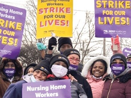 SEIU Healthcare Illinois workers cheer a new agreement reached with Infinity late Friday: 99 percent of union members voted to ratify over the weekend. (Facebook)